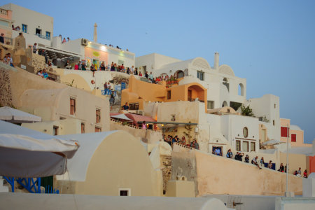 OIA, GREECE - SEPTEMBER 29, 2011: Sunset scene in the town of Oia, with locals and tourists, in the Santorini Thira Island, Greeceのeditorial素材