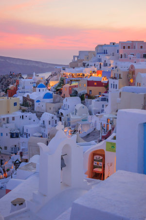 OIA, GREECE - SEPTEMBER 29, 2011: Sunset scene in the town of Oia, with locals and tourists, in the Santorini Thira Island, Greeceのeditorial素材
