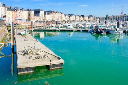 DIEPPE, FRANCE - SEPTEMBER 16, 2012: View of the port, with various boats, local businesses, locals and visitors, in Dieppe, Franceのeditorial素材