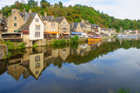 DINAN, FRANCE - SEPTEMBER 25, 2012: The old port area, with local businesses, locals and visitors, in Dinan, Brittany, Franceのeditorial素材