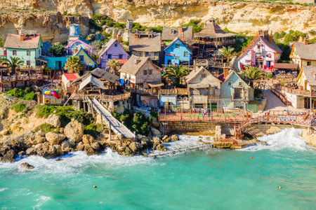 IL-MELLIEHA, MALTA - APRIL 09, 2012: View of the Popeye Village, with locals and visitors, in Il-Mellieha, Maltaのeditorial素材