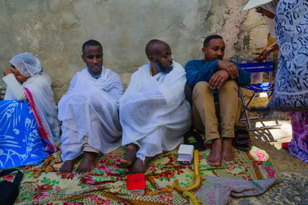 JERUSALEM, ISRAEL - APRIL 29, 2016: A crowd of Ethiopian Pilgrims gather in the Deir Es-Sultan, part of the church of the Holy Sepulcher, in Orthodox Good Friday. The old city of Jerusalem, Israelのeditorial素材