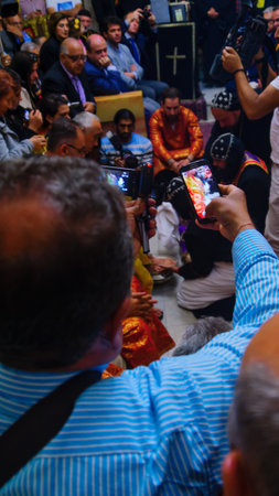 JERUSALEM, ISRAEL - APR 28, 2016: Washing of the Feet ceremony, in the Syrian Orthodox St. Marks church, with the patriarch and community members. Orthodox Holy Thursday in the old city of Jerusalem, Israelのeditorial素材