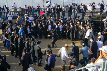 MERON, ISRAEL - MAY 26, 2016: A crowd of orthodox Jews attend and dance the annual hillulah of Rabbi Shimon Bar Yochai, in Meron, Israel, on Lag BaOmer Holiday.のeditorial素材