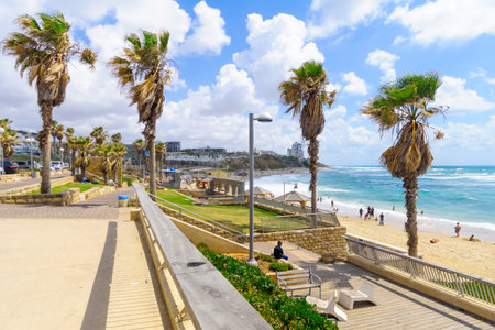 TEL-AVIV, ISRAEL - MAY 27, 2016: View of Givat Aliyah beach and nearby area, with locals and visitors, in the southern part of Jaffa, Now part of Tel-Aviv Yafo, Israelのeditorial素材