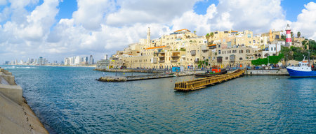 TEL-AVIV, ISRAEL - MAY 27, 2016: Panoramic view of the Jaffa port, the old city of Jaffa, and Tel-Aviv coastal skyline, with locals and visitors, now part of Tel-Aviv Yafo, Israelのeditorial素材