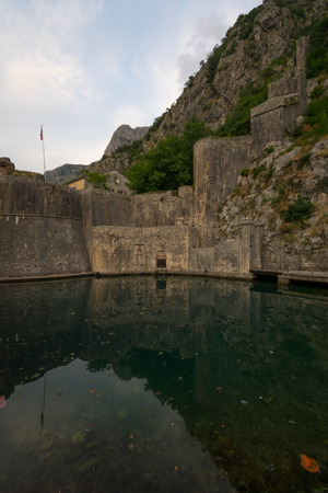 The South Gate (Gurdic Gate), dated 13 century, and the old town walls, in Kotor, Montenegroの写真素材