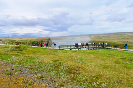 GULLFOSS, ICELAND - JUNE 11, 2016: The Gullfoss waterfall, with tourists, in southern Icelandのeditorial素材