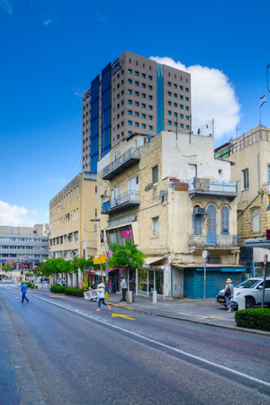 HAIFA, ISRAEL - AUGUST 18, 2016: Scene of Hadar HaCarmel district, with local businesses, locals and visitors, in Haifa, Israelのeditorial素材