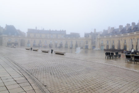 DIJON, FRANCE - OCTOBER 16, 2016: Fogy view of the liberation square (place de la liberation), in...