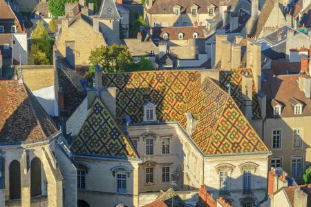 An aerial view of the historic center of the city, with a colored patterned roof, in Dijon, Burgundy, Franceの写真素材