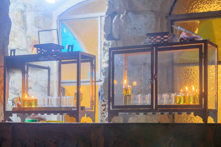 Traditional Menorahs (Hanukkah Lamps) with olive oil candles, in the Jewish quarter, in Safed (Tzfat), Israelのeditorial素材