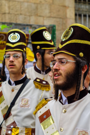 JERUSALEM, ISRAEL - MARCH 13, 2017: Ultra-orthodox Jewish men, some in costumes, as part of a...