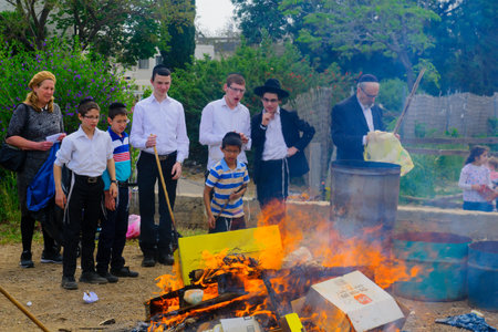 HAIFA, ISRAEL - APRIL 10, 2017: Jewish people perform Biur (burning) Chametz (leavened foods), in Haifa, Israel. This is part of the Passover holiday traditionsのeditorial素材