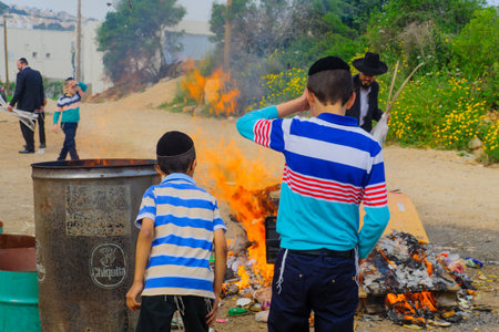 HAIFA, ISRAEL - APRIL 10, 2017: Jewish people perform Biur (burning) Chametz (leavened foods), in Haifa, Israel. This is part of the Passover holiday traditionsのeditorial素材
