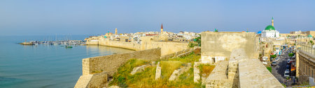 ACRE, ISRAEL - APRIL 27, 2017: Panoramic view of the city walls, the fishing harbor, business streets, the Ahmed el-Jazzar Mosque and the old city skyline, in Acre (Akko), Israelのeditorial素材