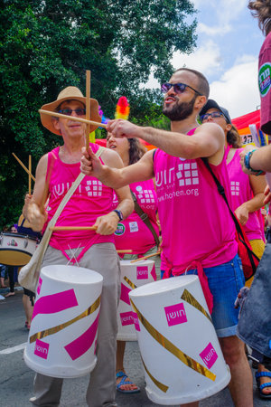 HAIFA, Israel - June 30, 2017: People play music, as part of the annual pride parade of the LGBT community, in the streets of Haifa, Israelのeditorial素材