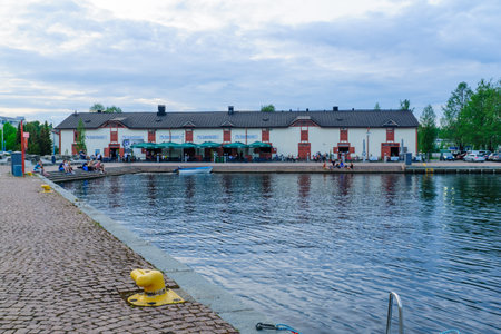 KUOPIO, FINLAND - JUNE 17, 2017: Scene of the passenger harbor, with locals and visitors, in Kuopio, Finlandのeditorial素材