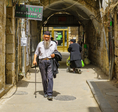 JERUSALEM, ISRAEL - JULY 12, 2017: Scene of the ultra-orthodox neighborhood Mea Shearim, with locals, in Jerusalem, Israelのeditorial素材