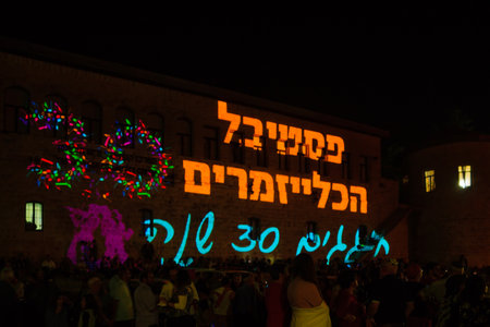 SAFED, ISRAEL - AUGUST 23, 2017: Text on wall: celebrating the 30th Klezmer Festival in Safed (Tzfat), Israel. Its an annual traditional Jewish festival in the public streets of Safedのeditorial素材