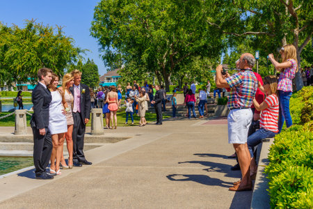IRVINE, USA - MAY 22, 2011: Prom photo shoot tradition, with the students and various family members...