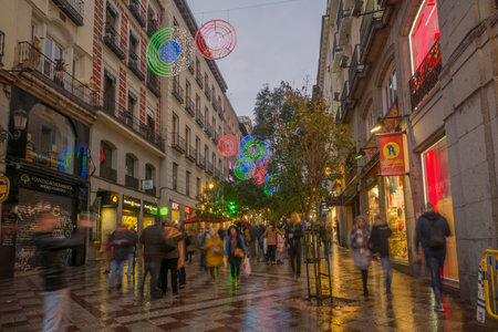 MADRID, SPAIN - DECEMBER 31, 2017: Scene of Montera street, with Christmas decoration, locals and visitors, in Madrid, Spainのeditorial素材