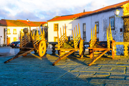 MIRANDA DO DOURO, PORTUGAL - DECEMBER 27, 2017: Wagon of donated woods (for Christmas fire) near the Cathedral, in the historic old town of Miranda do Douro, Portugalのeditorial素材
