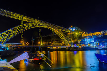 PORTO, PORTUGAL - DECEMBER 23, 2017: Night view of the Dom Luis I Bridge and the Douro river, in Porto, Portugalのeditorial素材