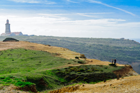 CASTELO, PORTUGAL - DECEMBER 29, 2017: Visitors look at the lighthouse of Cabo (cape) Espichel, Portugalのeditorial素材
