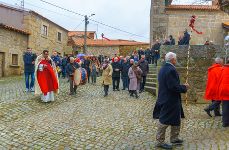 DUAS IGREJAS, PORTUGAL - DECEMBER 26, 2017: Villagers take part and circle the church, in the celebration of Santo Estevao, as part of Christmas event, in Duas Igrejas, Portugalのeditorial素材