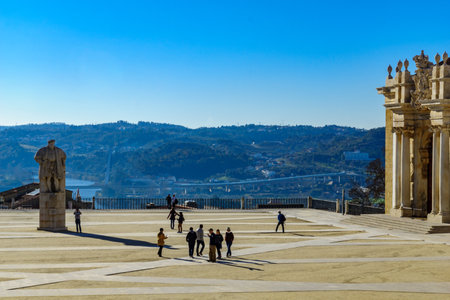 COIMBRA, PORTUGAL - DECEMBER 23, 2017: The old university courtyard, with landscape and visitors, in Coimbra, Portugalのeditorial素材