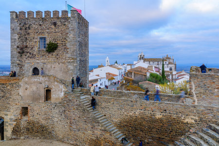 MONSARAZ, PORTUGAL - DECEMBER 29, 2017: View of the castle and the historic village, with visitors, in Monsaraz, Portugalのeditorial素材