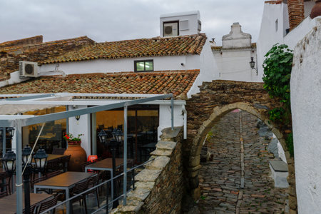 MONSARAZ, PORTUGAL - DECEMBER 29, 2017: View of an alley and restaurants, in Monsaraz, Portugalのeditorial素材