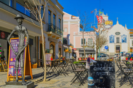 AVEIRO, PORTUGAL - DECEMBER 23, 2017: Scene of Praca 14 de Julho square, with local businesses, locals and visitors, in Aveiro, Portugalのeditorial素材