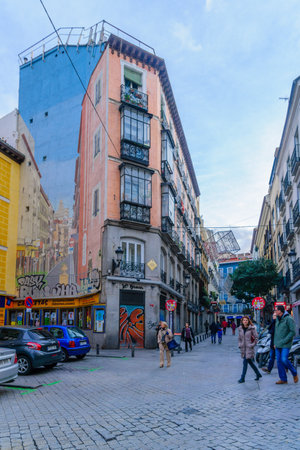 MADRID, SPAIN - JANUARY 1, 2018: Typical street with various buildings, locals and visitors, in Madrid, Spainのeditorial素材