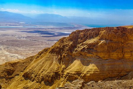 Cliffs and landscape of the Dead Sea, viewed from Masada, on the eastern edge of the Judaean Desert, Southern Israelの写真素材