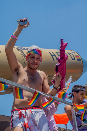 HAIFA, ISRAEL - JUNE 22, 2018: Dancers on a truck entertain the crowd, in the annual pride parade of the LGBT community, in Haifa, Israelのeditorial素材