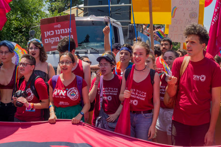 HAIFA, ISRAEL - JUNE 22, 2018: Various people take part and carry signs, in the annual pride parade of the LGBT community, in Haifa, Israelのeditorial素材