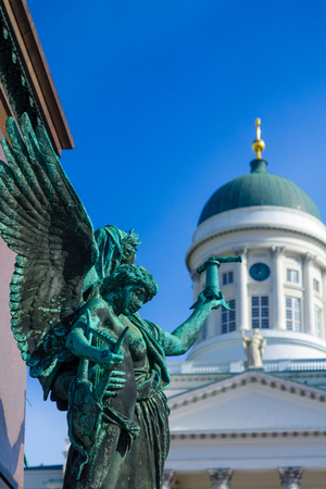 A monument of Emperor Alexander II, and the Lutheran Cathedral in the background, in Helsinki, Finlandの写真素材