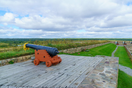 Louisbourg, Canada - September 20, 2018: Old guns in the fortress of Louisbourg, Cape Breton island, Nova Scotia, Canadaのeditorial素材