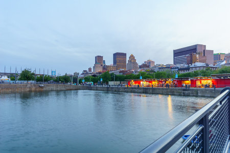 Montreal, Canada - September 09, 2018: Sunset view of downtown from the old port, with locals and visitors, in Montreal, Quebec, Canadaのeditorial素材