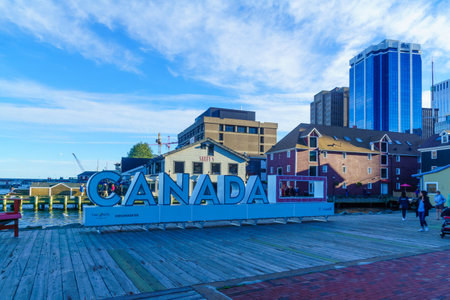 Halifax, Canada - September 22, 2018: View of harbor and downtown buildings, with locals and visitors, in Halifax, Nova Scotia, Canadaのeditorial素材