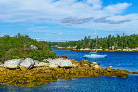 View of a bay and sailboat in west Dover, Nova Scotia, Canadaの写真素材