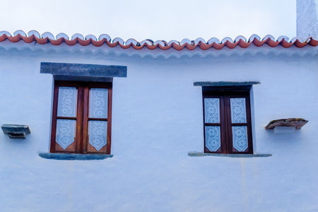 Typical wall and windows in the historic village of Monsaraz, Portugalの写真素材