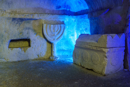Sarcophagus (Roman period coffin) and a carved Menorah, in a Jewish burial cave, in Bet Shearim National Park (Jewish Necropolis), Northern Israelの写真素材