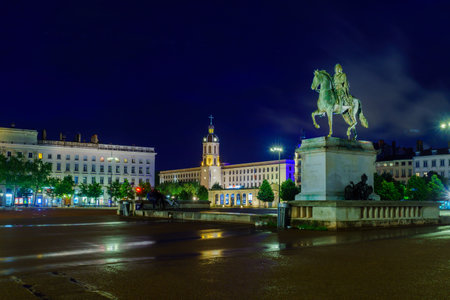 Lyon, France - May 08, 2019: Night view of the equestrian statue of Louis XIV, in Place Bellecour square, in Lyon, Franceのeditorial素材