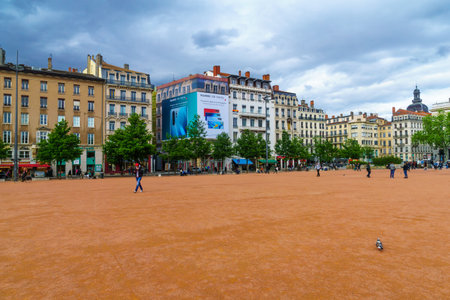 Lyon, France - May 09, 2019: Scene of Place Bellecour square, with locals and visitors, in Lyon, Franceのeditorial素材