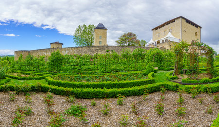 Saint-Bernard, France - May 04, 2019: View of the chateau (castle) and its gardens in Saint-Bernard, Ain department, Franceのeditorial素材