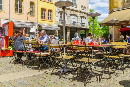 Lyon, France - May 10, 2019: Street and cafe scene, with locals and visitors, in Old Lyon, Franceのeditorial素材
