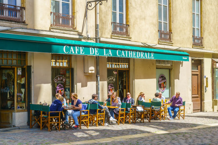 Lyon, France - May 10, 2019: Street and cafe scene, with locals and visitors, in Old Lyon, Franceのeditorial素材